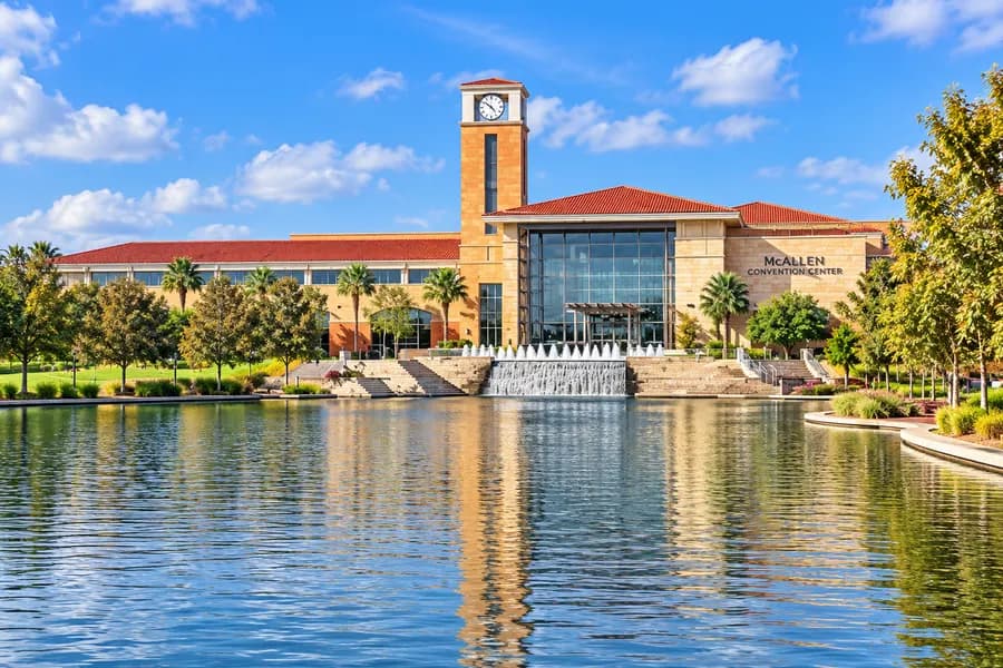 McAllen Convention Center — the clock tower, glass entrance and fountain lake